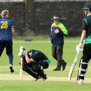 Jacob Gordon, centre left, is dejected after losing his wicket late on against Devon 			             Pictures: GRAHAM HUNT PHOTOGRAPHY