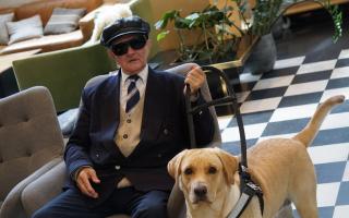 Brian Robinson, 78, with his guide dog Zena