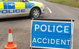 Lengthy delays after crash near busy roundabout
