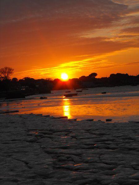 Images of a frozen sea with a beautiful sunset.
taken by Alexandra Farah age 17.