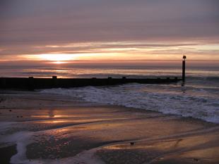Sunrise at Bournemouth beach, just off Portman Ravine. Taken by Pete Raymont.