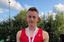 Adam Both with his silver medal at the Silver for Adam at English Schools’ Combined Events Championship