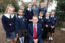 Executive headteacher Brian Hooper and school improvement lead Sian Thomas with pupils