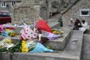 Floral tributes in the village of Corfe Castle