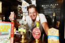 Proud: Tommy O’Sullivan, landlord of The Eight Bells at Eaton, is delighted to be included in CAMRA’s Good Beer Guide