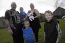 Teiron Shearing, right,  with dad Martyn holding Logan, mum Tarnia holding Neo and brother Kai