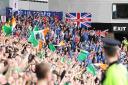 Rangers and Celtic fans during a Scottish Premier League match at Ibrox Stadium, Glasgow