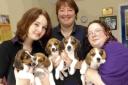 Lisa Samways, centre with staff at the Taylor’s Rehoming Centre with five abandoned puppies