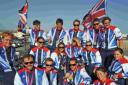 CELEBRATION: Team GB sailors, including Poole’s Annie Lush and Lucy and Annie Macgregor, on the open-top bus tour