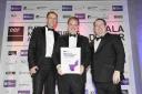 AWARD: Nicol Fraser, Dunedin partner; Paul Thomas, managing director at Haystack Dryers get their award from Declan Curry, right