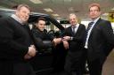 WHEEL DEAL: Ray Quinn picks up his new Range Rover at Car Link from Andy Toy, garage owner Alan Fisher and Jonathan Hall