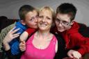 PRAISE: Sam Henney with her sons Callum, 10, and Drew, 12