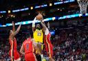 LeBron James goes for a basket (Gerald Herbert/AP)