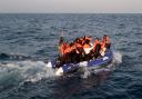 A group of people thought to be migrants crossing the Channel in a small boat headed in the direction of Dover, Kent. PA Photo. Picture date: Monday August 10, 2020. See PA story POLITICS Migrants. Photo credit should read: Gareth Fuller/PA Wire.