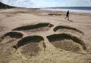 Giant paw prints have appeared on Bournemouth beach