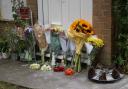 Floral tributes have been left for a man who died in a flat fire in Poole.