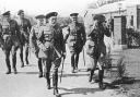 King George V heads a party of high ranking Royal Tank Corps officers including Colonel Lindsay, Colonel Broad and Major-General Capper in Bovington.