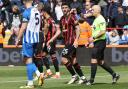 Marcos Senesi scored as Cherries beat Brighton