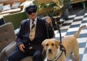 Brian Robinson, 78, with his guide dog Zena