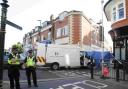 BIG OPERATION: Police at the scene of the murder in Roumelia Lane, Boscombe