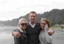 HAPPIER DAYS: Mark Longley with his daughters Emily, left and sister Hannah