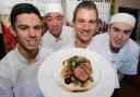 CHAMPION: Winner of the Christchurch Food Festival Young Chef of the Year competition, Jack Stoner, centre, with his winning dish and runners-up, from left, Ryan Proudley, Raymond Pang and Ryan Carpenter