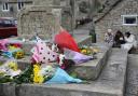 Floral tributes in the village of Corfe Castle