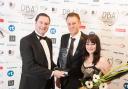 GROWING CONCERN: Greg Ford of Advanced Exchequer with Jonathan Davies and Hayley Evans of the Training Room, winner of the Business Growth Award at the 2015 Dorset Business Awards