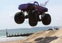 Monster truck show on the beach during last year's Wheels Festival