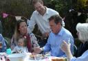Prime Minister, David Cameron visiting a family and having a BBQ in Lytchett Matravers in 2015