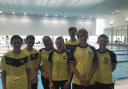 GOING THE DISTANCE: Poole’s distance swimmers at the Team Bath meet (l-r) Ben Deretz, Alastair Ferguson, Lucy Purcell, Molly Goddard, Louis Dunning, Miles Ward and Robbie Hemmings.