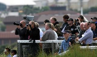 Spectators line the East Overcliff to watch the first flights at the start of the Air Festival.

