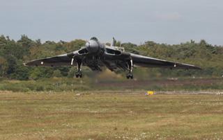 The Vulcan lands at Bournemouth Airport.