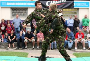 The Royal Marines Combat Display team in the Gardens