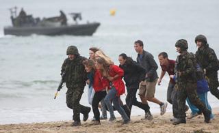 The Royal Marine Beach Assault. Marines rescue the hostages who were from  CCF (Combined Cadet Force)  Bournemouth School.