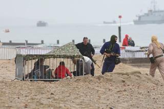 The Royal Marine Beach Assault. Terrorists guard the  hostages who were from CCF (Combined Cadet Force)  Bournemouth School.