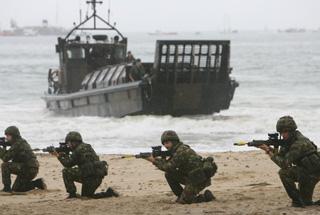 Royal Marines beach assault after terrorists  capture some children on the beach.