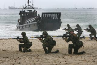 Royal Marines beach assault after terrorists  capture some children on the beach.