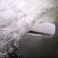 GIVE US A WAVE: Surfing the reef. Picture: paulhumberdesign.com