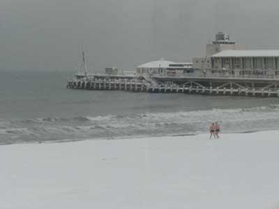 December 2, 2010. Braving the snow for a swim at Bournemouth seafront. Picture by Rachael Mills.