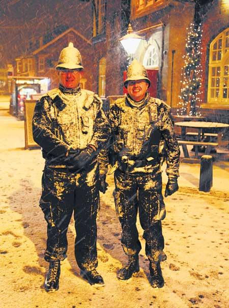 Response officers, Jonathan Williams and Chris Ingram, from Winton station, on patrol along Charminster Road at 11.30pm, -3 degrees centigrade, after the beginning of Bournemouth's heaviest snowfall for 17 years. Picture: John Nesbitt.