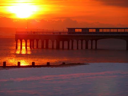 Sunset over a snowy Boscombe pier on December 2, by  Brian Willis