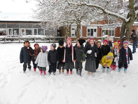 Enjoying the snow at Moyles Court school.  About half of the pupils and staff managed to attend Moyles Court  School and Nursery, near Ringwood on Thursday 2nd December, despite the snowy conditions.  