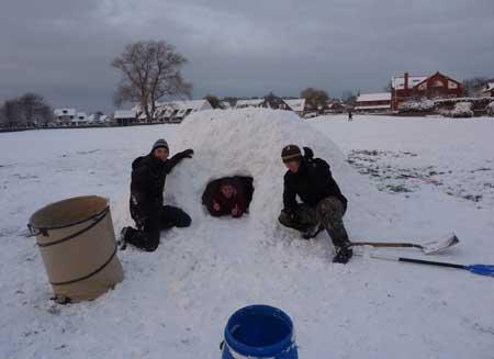 December 2010. 3 lads and their igloo on the Quomps in Christchurch. Taken by Vera Baber.