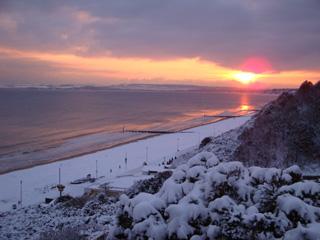 The winter solstice over west cliff. Sent in by Sarah Isherwood.