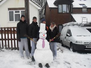 Jodie, Karl, Steve and Kieran's snow man on Lincoln Road in Parkstone. 