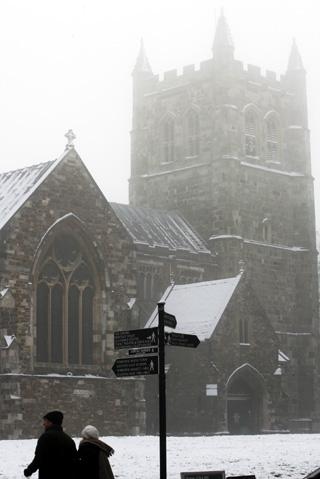 Wimborne Minster shrouded in freezing fog the day after first snowfall of the year where temperatures plummeted to minus 10 in places.