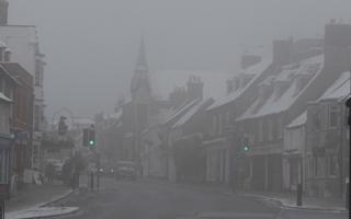 Wareham Town Centre in the snow and fog. 