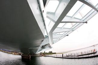 The main work to position the first leaf of the Twin Sails Bridge takes place. 18/7/11. View from underneath the bridge on the Hamworthy site.