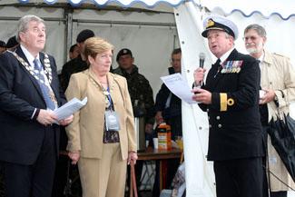 The first day of Bournemouth Air Festival sees torrential rainfall as Commodore Jamie Miller and the Mayor and Mayoress of Bournemouth take part in the official launch.